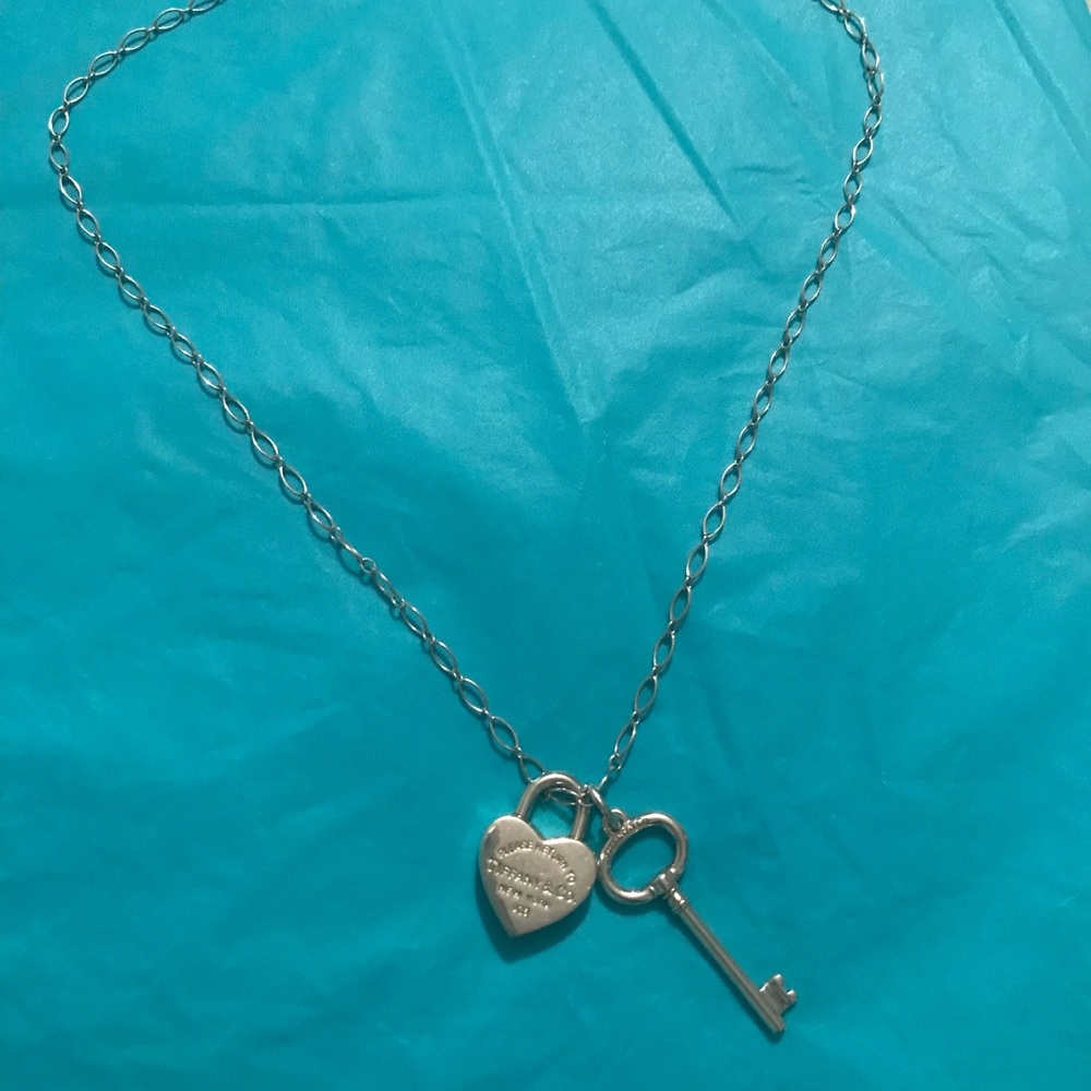 Tiffany sterling silver 16 inch chain with 3-D heart and key.